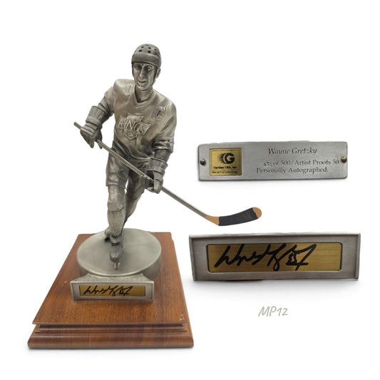 Lake Country Cards limited edition pewter Wayne Gretzky hockey statue on a wooden base with an autographed plaque.